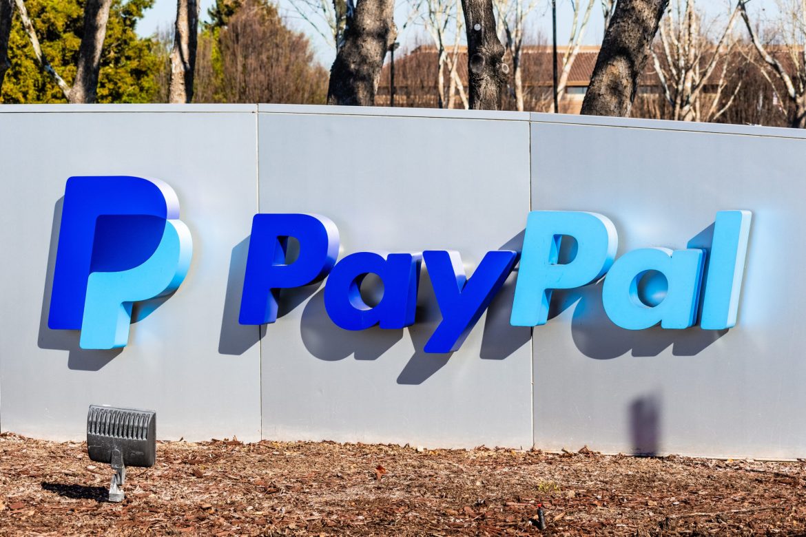 PayPal (NASDAQ: PYPL) stock price has bounced back in the past few months, helped by its ongoing turnaround. It jumped to a high of $74.40 this month, its highest point since August 2023. It has jumped by about 45% from its lowest point in December.
PayPal has faced many headwinds
PayPal has been one of the most embattled companies in the financial services industry. Its growth exploded during the Covid-19 pandemic as the number of customers soared to a record high.
PayPal benefited from the work-at-home situation and the soaring digital money transfer. As a result, its stock soared to over $300 in 2021 and then started its downtrend, settling at $50.21 in November last year. 
Its market cap surged to over $300 billion and then slipped to below $50 billion in 2023. This valuation has jumped to over $74 billion today.
PayPal’s crash happened as it faced numerous headwinds. First, it faced the challenge of soaring competition from other fintech companies. Its money transfer division faced competition from the likes of Wise, Remitly, and Payoneer.
Its unbranded business also faced robust competition from the likes of Google Pay, Amazon Pay, Apple Pay,  Stripe, Adyen, and Alipay, among others. This is a big issue since PayPal makes a substantial amount of money from the unbranded division. 
PayPal has also been losing customers over the years. Its total number of active customers jumped to over 435 million during the pandemic, a figure that has dropped to 429 million. 
PayPal turnaround continues
Now, PayPal, under new CEO Alex Chriss, has been working to turn its business around in a bid to reinvigorate growth.
As part of the turnaround strategy, the company has announced a big round of layoffs of about 9% of its total workforce. 
It has also embarked on some financial engineering by increasing its share repurchases. These buybacks help to boost a company’s stock by making the earnings per share (EPS) higher. 
The logic behind share repurchases is simple. Assume that a company has 1,000 outstanding shares and it makes $100,000 in profit. This means that each share will be worth $100. If the company reduces the outstanding shares to 800, it means that its earnings per share will be $125. 
PayPal has also launched new products, with the PYUSD being the most notable one. PYUSD is a stablecoin that has attracted over $770 million in assets. Stablecoins make money when the developers invest the cash and earn interest. In some cases, they also make money through transaction costs.
PayPal’s challenge in the stablecoin industry is that the sector is currently controlled by Tether, which has over $118 billion in assets. Its earnings in the last financial year stood at over $6 billion, making it more profitable than Blackrock.
PayPal has also launched Fastlane, a feature that helps to simplify online shopping by letting people checkout faster. It is similar to Amazon’s 1-click and Shopify’s Shop Pay. Most recently, <a href="https://invezz.com/news/2024/08/23/currencynewsbreaks-paypal-holdings-inc-nasdaq-pypl-challenges-apple-wallet-in-the-eu/">PayPal partnered with Adyen</a> to promote the service. 
Read more: <a href="https://invezz.com/news/2024/08/20/3-reasons-why-paypal-stock-is-a-smart-investment-now/">3 reasons why PayPal stock is a smart investment now</a>
PayPal boosted its guidance
The most recent financial results showed that PayPal’s revenue growth has slowed recently. Its revenue rose by 8% in the last quarter to over $7.9 billion. In the past, PayPal was used to make double-digit growth as its popularity rose. 
Its total transaction volume rose by 11% to $416 billion while its payment transactions rose by 8% to $6.6 billion. Active accounts continued to fall, reaching 429 million in the last quarter. On the positive side, there are signs that the subscriber loss is falling.
PayPal also boosted its forward guidance for the third quarter and full year. It expects that its revenue growth will be mid-single-digit while its EPS will be between 96 and 98 cents. 
What is clear, however, is that PayPal’s growth days are behind and that the company should be valued as a value stock. According to <a href="https://seekingalpha.com/symbol/PYPL/valuation/metrics">SeekingAlpha</a><strong>, </strong>PayPal’s forward P/E ratio stands at 18 while the trailing multiple is 17. 
In contrast, Mastercard has multiples of 38 and 35 while Visa has 31 and 30. Block, formerly known as Square, has P/E multiples of 61 and 36. PayPal will need to demonstrate more growth to justify a higher valuation.
PayPal stock price analysis
The PYPL share price bottomed at $50.21 in November last year and has rebounded to almost $75. It formed a golden cross pattern in August as the 200-day and 50-day moving averages crossed each other. 
The stock has now flipped the important resistance point at $70.65 into a support level. This was a notable price since it was its highest level since April this year. 
Therefore, the path of the least resistance for the stock is bullish, with the next target being the psychological point at $80, which is about 10% above the current level. A break above that point will see it jump to the next point at $100. 
The post <a href="https://invezz.com/news/2024/09/19/paypal-stock-analysis-the-train-already-left-the-station/">PayPal stock analysis: the train already left the station</a> appeared first on <a href="https://invezz.com/">Invezz</a> PayPal stock analysis: the train already left the station