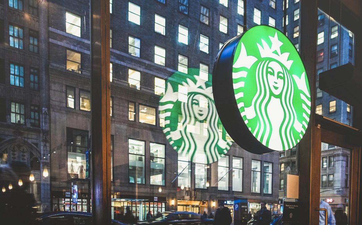 Bernstein upgraded Starbucks Corporation (NASDAQ: SBUX) to an Outperform rating from Market Perform on September 26, 2024, while raising its price target from $92 to $115.
This move points to a renewed optimism around the company, largely driven by confidence in CEO Brian Niccol’s ability to execute a turnaround.
Niccol’s experience in reviving brands like Taco Bell and Chipotle is seen as key to addressing Starbucks’ operational challenges.
Bernstein’s new target reflects a potential 20% upside, underpinned by lower G&A expenses, organizational streamlining, and a shift in focus towards operational stability.
Starbucks’ potential also hinges on recovery in key markets like China, where the company faces pressure but is expected to benefit from partnerships or spin-offs.
The firm’s vision includes improving food offerings, navigating macroeconomic challenges, and capitalizing on lower interest rates. The stock continues to enjoy a consensus Buy rating across Wall Street, though not all analysts are bullish.
Jefferies downgrades Starbucks over union concerns
Jefferies, notably, downgraded Starbucks to Underperform just two days earlier, warning that Niccol’s strategy, while promising, may not yield immediate results.
They cited concerns over challenges like unionization and operational hurdles. 
Jefferies’ price target of $76 sharply contrasts with Bernstein’s, reflecting skepticism about near-term earnings and guidance for FY25, which they anticipate will underwhelm.
The broad disparity in analyst opinions highlights the complexity Starbucks faces in its turnaround effort.
Recent developments also include leadership changes, with Starbucks’ North America CEO Michael Conway stepping down in September 2024.
Conway’s departure further consolidates Niccol’s control over the company, as the role will not be filled.
This decision is expected to streamline Starbucks’ operations but comes at a time when the company is juggling labor negotiations and efforts to address union-related tensions, which have been a point of contention.
Starbucks Q3 revenue falls short, China sales drop 14%
Financially, Starbucks reported $9.1 billion in revenue for its Q3 FY24, slightly missing expectations by $150 million.
Global comparable store sales declined 3%, with North America falling by 2%, and China by 14%. 
While the company opened 526 net new stores, these figures reflect the current struggles to reignite foot traffic and maintain growth, particularly in China.
With competition rising and macroeconomic pressures still affecting discretionary spending, the outlook remains cautious for FY25.
Competition and costs weigh on Starbucks’ growth outlook
Starbucks’ valuation has been a contentious point. With its forward price-to-earnings (P/E) ratio at 26.9x, the stock trades above its sector peers, yet below its five-year average of 35x.
Despite the pullback, the premium multiple suggests investors remain optimistic about Niccol’s ability to steer the company back to growth.
However, some analysts argue that the current price already factors in much of the optimism surrounding the CEO change, and additional risks like rising labor costs and competition could limit upside potential.
While many view Starbucks’ brand strength as an enduring asset, particularly in international markets, it faces mounting competition from both local and global players.
Companies like Luckin Coffee in China and McDonald’s in the US are eating into Starbucks’ market share, which adds pressure to the company’s margins and growth trajectory.
Starbucks’ ambitious plans for digital expansion and menu revamps are promising but will require careful execution to restore investor confidence.
All eyes are on how Starbucks will navigate its transformation, particularly with regard to managing costs and improving its value proposition without alienating its customer base.
With this backdrop in mind, let’s now turn our attention to the charts and see what they reveal about the potential price trajectory of Starbucks stock moving forward.
Has the long-term downtrend ended?
Starbucks’ stock reached its yearly high above $125 in July 2021 but then entered a long-term downtrend.
Source: <a href="https://www.tradingview.com/symbols/NASDAQ-SBUX/">TradingView</a>
However, that downtrend appears to have ended last month, following a record surge driven by the new CEO appointment.
What’s signaling strong upward momentum is that, despite last month’s surge, the stock hasn’t retraced much and continues to hit new highs.
Investors could consider entering long positions at current levels, with a stop loss set below the recent swing low of $90.18. 
If the uptrend continues, the stock could soon retest the $125 level.
On the flip side, bearish traders have a low-risk opportunity with the stock trading near short-term resistance around $107.
They could initiate short positions near $100, placing a stop loss at $107.30. If bullish momentum weakens, the stock may drop below $90.
The post <a href="https://invezz.com/news/2024/09/26/bernstein-upgrades-starbucks-to-outperform-raises-price-target-to-115-is-it-a-buy/">Bernstein upgrades Starbucks to Outperform, raises price target to $115: is it a buy?</a> appeared first on <a href="https://invezz.com/">Invezz</a> Bernstein upgrades Starbucks to Outperform, raises price target to $115: is it a buy?
