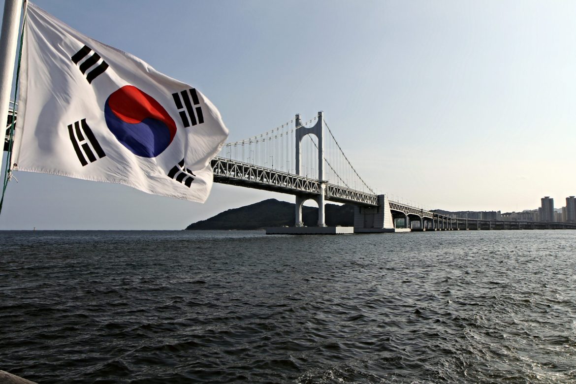 South Korea’s stock market faced a turbulent 2024, with the benchmark Kospi index declining over 7%. 
This significant underperformance compared to other regional markets has underscored the widening of the “Korea discount,” a long-standing issue tied to concerns over corporate governance and shareholder influence in chaebol-dominated industries. 
According to a <a href="https://www.cnbc.com/2024/12/12/south-koreas-martial-law-fiasco-bodes-ill-for-its-stock-market.html">report by CNBC</a>, the recent political turmoil is likely to deepen this trend.
The country’s “Corporate Value-Up” program, launched in February to address the “Korea discount,” has failed to stem investor concerns about weak corporate governance in its chaebol-dominated economy.
As of December 12, the Kospi’s price-to-book ratio stood at 0.86, and its price-to-earnings ratio at 13.65—both metrics showing declines from a year earlier.
For comparison, Japan’s Nikkei 225 index, which has benefited from similar reforms, boasts a price-to-book ratio of 1.44 and a price-to-earnings ratio of 15.90. 
While Japan’s equity markets surged due to successful policy implementation, South Korea has lagged behind, leaving investors skeptical of its ability to bridge the valuation gap.
Political upheaval amplifies investor concerns
Political turmoil has <a href="https://invezz.com/news/2024/12/12/kospi-index-forms-a-risky-pattern-amid-samsung-hyundai-lg-woes/">exacerbated the situation</a>. 
On December 3, President Yoon Suk Yeol briefly imposed martial law before revoking it within hours, <a href="https://invezz.com/news/2024/12/03/south-korean-stocks-tumble-as-president-yeol-declares-emergency-martial-law/">triggering widespread uncertainty</a> and a rise in the risk premium for Korean assets. 
The Kospi has underperformed the MSCI Asia ex-Japan index by 2.3 percentage points since the incident, signalling deteriorating investor confidence.
The political instability has also cast doubt on the future of the “Value-Up” reforms. 
The attempt at martial law has sent the risk premium for Korean assets higher, thereby dealing a setback to the “Value-Up Program,” Vishnu Varathan, managing director and head of macro research for Asia ex-Japan at Mizuho Securities said in a Dec. 10 note.
President Yoon narrowly avoided an impeachment vote last weekend after members of his ruling People’s Power Party walked out of parliament. 
However, opposition parties have vowed to continue efforts to unseat him, adding to the ongoing uncertainty.
Governance issues rooted in chaebol dominance
South Korea’s chaebols, including Samsung, LG, SK, and Hyundai, wield outsized influence on the economy, collectively contributing nearly 40% of the country’s GDP. 
While these conglomerates are crucial to South Korea’s industrial prowess, their complex shareholding structures often favour founding families at the expense of external investors, perpetuating governance concerns.
Efforts to reform chaebol practices have seen limited success. 
The “Korea-Value Up Index,” introduced in September to spotlight companies adhering to the Value-Up program, has also struggled to gain traction. 
The index’s price-to-book ratio of 0.99 and price-to-earnings ratio of 10.29 highlight the challenges of boosting market confidence.
“The distractions of ousting Yoon amid fragile government and fragmented politics is likely to dilute and delay policy efforts to boost equity valuations,” Varathan said, adding that the power dynamics in South Korea could tilt further in favour of large, influential conglomerates, potentially exacerbating the “Korea discount.”
Weak economic outlook prolongs challenges
Economic conditions have compounded the struggles. 
A <a href="https://invezz.com/news/2024/12/04/usd-krw-how-low-can-the-south-korean-won-plunge/">weakening Korean won</a>, slowing exports, and reduced global demand have all weighed on South Korea’s markets. 
Jeff Ng, head of Asia Macro Strategy at Sumitomo Mitsui Banking Corporation, predicts that the Korea discount will persist into 2025. 
“Investor confidence may return in the medium-term, but a swift resolution of the domestic uncertainty looks unlikely at this stage,” she said. 
Lorraine Tan, director of equity research for Asia at Morningstar, echoed these sentiments. 
“I think the longer the leadership change takes, the more likely investors will be sidelined. President Yoon is unpopular and a peaceful transition away from his leadership would help,” she pointed out.
The post <a href="https://invezz.com/news/2024/12/12/will-south-koreas-political-turmoil-worsen-the-korea-discount-compound-investor-woes/">Will South Korea’s political turmoil worsen the Korea discount, compound investor woes?</a> appeared first on <a href="https://invezz.com/">Invezz</a> Will South Korea’s political turmoil worsen the Korea discount, compound investor woes?