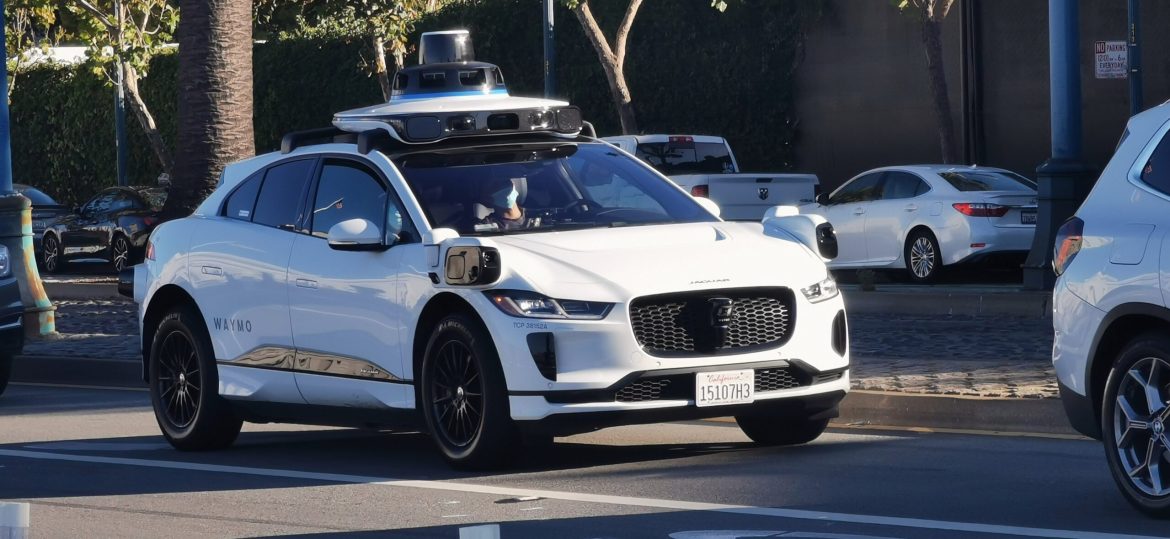 The US robotaxi industry has witnessed seismic shifts in 2024, marking a pivotal year in its journey toward mass adoption. 
Alphabet’s Waymo has emerged as a dominant force, outlasting competitors such as General Motors’ now-defunct Cruise.
The autonomous vehicle (AV) sector is projected to form a significant part of the $480.09 billion global ride-sharing market by 2032, according to Fortune Business Insights. 
Key players, including Tesla and Amazon-owned Zoox, are jostling for market share, albeit with varying progress.
Waymo outpaces competitors with 5 million autonomous trips
Waymo, a subsidiary of Alphabet, has solidified its position in the US market after completing over 5 million autonomous rides across cities like San Francisco, Phoenix, and Los Angeles. 
This milestone marks a dramatic rise from the 700,000 trips recorded just a year earlier. The company’s robotaxi services now span 500 square miles of public roads, showcasing its ability to navigate complex urban environments effectively.
With a $5.6 billion multiyear investment from Alphabet announced in July, Waymo is prioritizing aggressive yet safety-focused expansion. 
Plans for 2025 include launching in Austin and Atlanta and extending its service to international markets, beginning with Tokyo.
The company has also collaborated with Geely and Hyundai to integrate advanced AV technology into electric SUVs, reducing costs and enhancing scalability.
Despite its progress, Waymo faces challenges in maintaining public trust, particularly after viral incidents involving its vehicles. 
To address these concerns, the company has ramped up public affairs efforts, safety reports, and collaborations with regulatory bodies like the National Highway Traffic Safety Administration.
Tesla unveils Cybercab but lags in deployment
Tesla’s foray into the robotaxi market has been characterized by bold promises but limited tangible progress. 
At its October event, CEO Elon Musk unveiled the Cybercab, a futuristic two-seater designed without steering wheels or pedals, priced under $30,000 and slated for production by 2027.
While the concept has generated significant buzz, Tesla has yet to secure permits for operating commercial robotaxi services in major US cities.
The company continues to sell its partially automated driver-assistance systems, Autopilot and Full Self-Driving (FSD), which require human supervision. 
Musk’s claim that regulatory hurdles have delayed Tesla’s robotaxi ambitions has been met with skepticism, as Waymo’s advancements demonstrate the feasibility of operating within existing laws. 
Critics also point to Tesla’s history of missed deadlines, questioning the viability of its ambitious timelines.
Zoox innovates with toaster-like shuttles and gains traction
Amazon-owned Zoox has carved a niche in the AV market with its distinctive, toaster-shaped shuttles, designed to carry passengers without traditional controls like steering wheels. 
The vehicles, which debuted in Foster City, California, in February, have been authorized to operate under diverse conditions, including light rain and speeds up to 45 mph.
Zoox aims to expand its pilot services to Las Vegas and San Francisco in 2025, offering free rides to select users through its Zoox Explorers program. 
The company’s focus on passenger comfort, safety, and design innovation has earned it a loyal following, with its AVs featuring ambient lighting, music, and interior cameras for monitoring.
Notably, Zoox has attracted top industry talent, including Tesla’s former autopilot hardware leader, Zheng Gao. 
However, the company’s ambitions are tempered by the operational complexities and regulatory hurdles inherent in scaling its services.
The post <a href="https://invezz.com/news/2024/12/27/robotaxi-showdown-will-amazons-zoox-and-tesla-dethrone-waymo/">Robotaxi showdown: will Amazon’s Zoox and Tesla dethrone Waymo?</a> appeared first on <a href="https://invezz.com/">Invezz</a> Robotaxi showdown: will Amazon’s Zoox and Tesla dethrone Waymo?