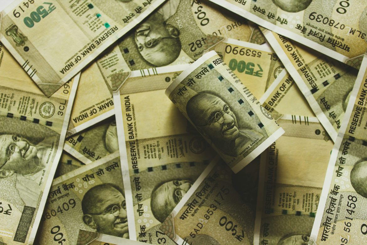 The Indian rupee saw a modest recovery on December 20, appreciating by 6 paise to open at Rs 85.07 against the US dollar in early trade. 
This comes after it hit an all-time low of Rs 85.13 <a href="https://invezz.com/news/2024/12/19/india-market-update-nifty-slides-below-24000-rupee-sinks-to-all-time-low/">the previous day</a>, depreciating by 19 paise.
The currency briefly stabilised during the session, trading at Rs 85.10 by midday, as foreign exchange markets navigated a mix of global and domestic pressures. 
While this rebound offers a sliver of optimism, significant headwinds persist, raising concerns over the rupee’s stability in the near term.
Dollar strength drives rupee’s decline
The rupee’s struggles can be largely attributed to the ongoing strength of the US dollar, supported by global economic conditions. 
The Dollar Index (DXY), which measures the greenback’s performance against a basket of six major currencies, edged up by 0.03% to 108.43. 
Forex traders cited the Federal Reserve’s cautious stance on future rate cuts as a contributing factor.
The central bank recently reduced its expected number of rate cuts in 2025 from four to two, bolstering the dollar and placing emerging market currencies, including the rupee, under considerable pressure.
Domestically, the Reserve Bank of India’s (RBI) limited intervention and tightening liquidity in the banking sector have amplified challenges for the rupee. 
Analysts predict that the USDINR pair will remain within the Rs 84.70 to Rs 85.20 range in the short term. 
Foreign Institutional Investor (FII) outflows have further strained the currency. 
On December 19, FIIs sold shares worth Rs 4,224.92 crore in Indian capital markets, extending their recent trend of offloading assets.
Meanwhile, falling equity markets are also weighing on sentiment. 
The BSE Sensex slipped 145.13 points to trade at 79,072.92, while the NSE Nifty <a href="https://invezz.com/news/2024/12/20/indian-shares-extend-losses-to-fifth-day-nifty-dips-below-23850/">declined by 17.40 points to 23,934.30</a>. 
Weakness in equities often exacerbates currency depreciation by reducing investor confidence in the local market.
Oil prices offer temporary relief
Amid these challenges, declining crude oil prices have emerged as a rare positive for the rupee. 
Brent crude futures dropped by 0.62% to $72.43 per barrel, alleviating pressure on India’s import bill. 
As one of the world’s largest oil importers, lower prices provide some cushion to the rupee by narrowing the trade deficit. 
This relief may be short-lived if global oil prices rebound or other external pressures intensify.
Despite its marginal recovery, the rupee faces a tough road ahead. 
Sustained dollar strength, domestic issues such as limited RBI intervention, and persistent FII outflows will likely keep the currency under pressure.
In the near term, analysts recommend a cautious outlook, with the rupee expected to consolidate within its current trading range. 
Without significant policy intervention or a reversal in global trends, the rupee’s path to sustained recovery remains uncertain.
The post <a href="https://invezz.com/news/2024/12/20/indian-rupee-rebounds-slightly-after-hitting-record-low-of-rs-85-13/">Indian rupee rebounds slightly after hitting record low of Rs 85.13</a> appeared first on <a href="https://invezz.com/">Invezz</a> Indian rupee rebounds slightly after hitting record low of Rs 85.13
