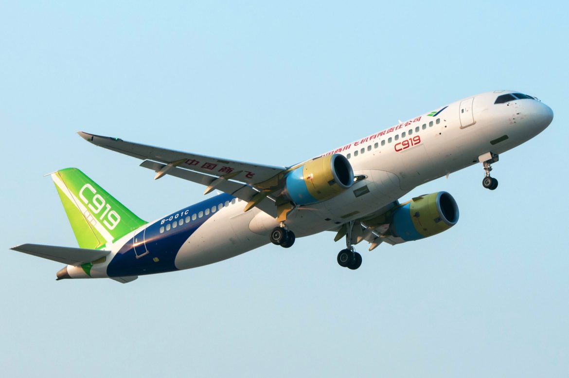 Last month, China’s homegrown large passenger aircraft, the C919, crossed a critical milestone by completing its first international flight—a scheduled journey to Hong Kong. 
The C919 jet, produced by the Chinese state-owned aircraft manufacturer Commercial Aircraft Corporation of China (COMAC), is now aiming to open new routes to Southeast Asia for the planes by 2026, according to Reuters, in what would be a first step for the planemaker to expand beyond the domestic market. 
COMAC is also seeking European certification for the C919 as early as this year. This would enable airlines to fly the jet in more countries globally. 
The C919 is currently in service with major Chinese carriers like Air China and China Southern Airlines. 
China’s ambition to challenge the Boeing-Airbus duopoly is a decade and a half in the making. 
However, with a string of fatal accidents, airborne mishaps and <a href="https://invezz.com/news/2024/09/13/boeing-factory-workers-to-strike-halting-jet-production/">workers’ strikes</a> denting Boeing’s reputation and production, as well as supply constraints impacting the larger aircraft manufacturing industry, the question of whether China can do so successfully, has received a fresh lease of life. 
<em>Invezz</em> takes a look at the various aspects shaping the debate:
COMAC’s product catalogue
Currently, the COMAC produces three types of aircrafts. 
The C909 is a regional jet and the company’s first marketed aircraft which is suitable for relying on regional airports or sub-hub airports to build route networks and supplement transport capacity for hub airports. 
The C919 is COMAC’s narrow-body aircraft with a capacity of up to 190 passengers, and a range of nearly 5,500 kms. 
It is this aircraft which is directly pitched against Boeing and Airbus’ narrow-body aircrafts like the Airbus 320 and the Boeing 737 Max.
The C929 is a wide-body jet which rivals Airbus’ A350 and Boeing’s 787. 
The aircraft is in the preliminary design and supplier selection phase, with plans to move to the detailed design stage soon.
Airlines could take deliveries of the C929 as early as 2027.
However, with narrow-body or single-aisle aircrafts being the most widely used airliners across the world, it is the COMAC C919 whose flight path will determine how far the COMAC can go.
The case for COMAC being a veritable challenger
COMAC’s aspirations come amid a turbulent time for its competitors. 
Boeing, still recovering from production setbacks and reputational damage following <a href="https://invezz.com/news/2024/07/01/the-boeing-crisis-will-the-company-make-it-out-alive/">a string of high-profile accidents</a>, delivered only 348 aircraft in 2024—a third of its 2023 output.
Its annual deliveries in 2024 was also its lowest since Covid-19 pandemic. 
“It will be years before Boeing returns to its normal production rates,” Scott Hamilton, managing director of Leeham Company, and aviation veteran, told <em>Invezz. </em>
While Airbus fared better, delivering 766 planes last year, the most since 2019, it is not immune to supply chain constraints and currently sits on a 8,648-aircraft backlog.
“From a demand perspective, the opportunity (for COMAC) certainly exists,” <a href="https://www.cirium.com/thoughtcloud/ascend-consultancy-weekly-team-perspective-can-comac-truly-challenge-the-airbus-boeing-duopoly/">says Rob Morris</a><strong>,</strong> Global head of consultancy, Cirium Ascend Consultancy.
Cirium’s Fleet Forecast predicts a need for more than 40,000 single-aisle and twin-aisle passenger jets over the next 20 years. 
Unless Airbus and Boeing double their production capacity, there’s room for a third player, it says. 
Challenges to COMAC’s rise
Despite its ambitions, COMAC faces significant production hurdles. 
The C919 has amassed over 1,000 orders from Chinese airlines and lessors, including Air China and China Eastern, but the manufacturer is facing an extensive backlog. 
As of December 2024, COMAC had delivered just 14 aircraft to the three Chinese airlines. 
It now hopes to deliver twice the number of its C919 passenger jets this year as it scales up production to meet demand.
“Comac anticipates it will dispatch 30 units of the C919 this year with a production capacity scale of up to 50 units,” the company’s vice-president Shen Bo said on Friday, according to news portal ThePaper.cn.
<em>Source: <a href="https://www.cirium.com/thoughtcloud/ascend-consultancy-weekly-team-perspective-can-comac-truly-challenge-the-airbus-boeing-duopoly/">Cirium Aviation Analytics</a></em>
Despite the update, capacity remains a major concern for the manufacturer and it was forced to scale back its production plans as it struggled to meet demand.
Hamilton notes that while Boeing’s and Airbus’s challenges, along with the global aircraft backlog, create opportunities for COMAC which are more pronounced in relation to Boeing than Airbus, all three manufacturers face similar supply chain constraints.
COMAC’s reliance on Western technology and components further complicates its production capabilities, particularly amid ongoing geopolitical tensions.
The road to global certification
For COMAC to establish itself internationally, certification by global aviation authorities is critical. 
The European Union Aviation Safety Agency (EASA) has been evaluating the C919 since 2019, with flight tests expected to begin as early as 2025.
In August 2024, the EASA completed its fourth round of on-site assessments, a critical step in evaluating the aircraft’s regulatory compliance. 
However, in an interview with Reuters last year, Luc Tytgat, acting executive director of EASA said the plane is “too new for us to know how easy or difficult it will be” to certify quickly.
China is stepping up regulatory pressure to win foreign backing for its new jet, but industry sources have warned the landmark approvals from Western regulators could take years.
Gaining certification from the US Federal Aviation Administration (FAA) presents a tougher challenge. 
“The FAA would be more problematic due to the negative fallout from the Max crises,” Hamilton says. 
The inclusion of COMAC on a US Defense Department list of Chinese military companies earlier this month has further complicated its prospects. 
COMAC’s flagship aircraft, such as the C919, heavily depend on US and Western technology. The designation may impede COMAC’s ability to certify and deliver aircraft to international markets.
Further, since global aviation supply chains are interdependent, the move might also compel non-US suppliers to reconsider dealings with COMAC to avoid secondary sanctions.
Hamilton concedes that due to the ongoing trade war between western countries, particularly the US and Europe, and China, as well as China’s alignment with Russia, its international ambitions will get impacted. 
Domestic market to largely drive COMAC’s sales
COMAC’s strongest advantage lies in its massive domestic market, which could account for 15% of global single-aisle aircraft deliveries by 2043. 
With more than 6,000 new single-aisle deliveries expected in China over the forecast period (of up till 2043), C919 is expected to capture around 25% market share compared to Boeing’s 30% and Airbus’s 45%, Cirium said. 
However, analysts predict fewer than 250 C919s will be sold outside China, primarily to nations with strong Belt and Road Initiative ties.
“Within China, the government must approve all orders, so Beijing will dictate who gets what. Outside China, it will be a matter of where China had the most influence politically or via investments,” Hamilton says, adding that Indonesian airline TransNusa is also partly owned by the Chinese lessor CALC so it is getting C909 and C919. 
Verdict: Will COMAC join the elite club?
While COMAC has the potential to join Airbus and Boeing in the commercial aircraft market, its journey will likely be slower than Airbus’s entry in the 1980s, says Morris. 
Cirium’s backlog indicates an expectation that COMAC will deliver more than 130 aircraft to customers in 2031. 
Delivery of around 1,800 single-aisle aircraft is expected globally in 2029, so 150 aircraft from COMAC would represent less than 10% of the total market, he says.
He adds that Boeing, despite its current struggles, is expected to restore production of its 737 family to four times COMAC’s 2029 target. 
Similarly, Airbus is projected to produce its A320 family at nearly six times COMAC’s scale in the same timeframe.
“The barriers to entry in the large commercial aircraft market have always been huge – potentially insurmountable for many as witnessed by Bombardier’s ultimately doomed efforts with its CSeries,” Morris said. 
<blockquote>
…COMAC can leverage the domestic market to generate sales. But for now the relative pace of those sales seems set to be much slower than even Airbus achieved as it entered the market in the 1980s. Hence, it seems likely that it will be a very long time before AB today genuinely becomes ABC.
</blockquote>
The post <a href="https://invezz.com/news/2025/01/20/comac-dreams-of-international-skies-can-the-chinese-aircraft-manufacturer-rival-boeing-and-airbus/">COMAC dreams of international skies: can the Chinese aircraft manufacturer rival Boeing and Airbus?</a> appeared first on <a href="https://invezz.com/">Invezz</a> COMAC dreams of international skies: can the Chinese aircraft manufacturer rival Boeing and Airbus?