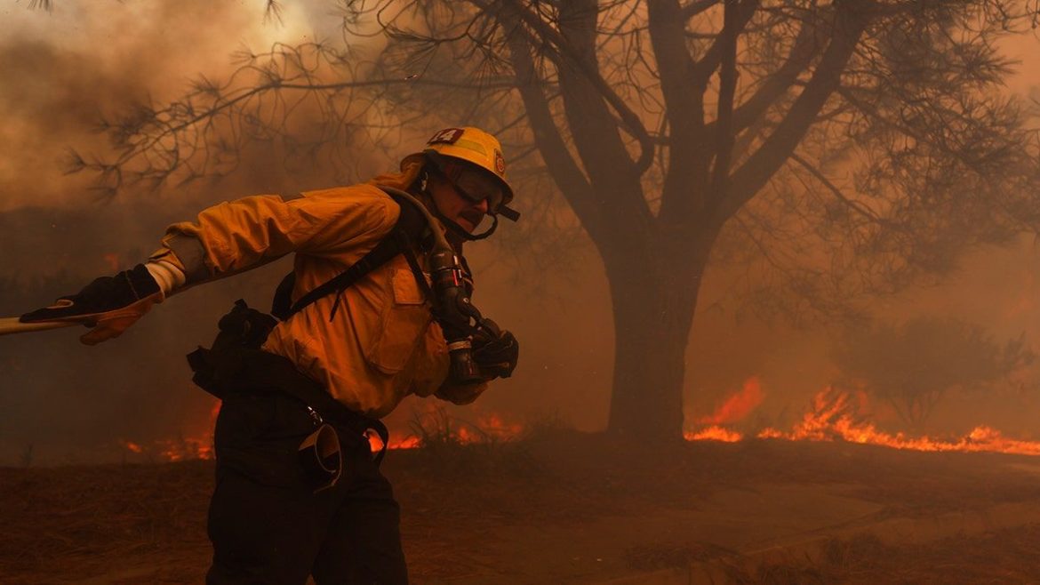 A fast-moving wildfire freshly tore through the Hollywood Hills early Thursday, threatening a region synonymous with the American film industry. 
The blaze added to the strain on millions of Los Angeles residents already grappling with devastating fires that have decimated entire neighborhoods and turned the skies into a smoky, ember-filled haze.
At least five lives have been lost, and <a href="https://invezz.com/news/2025/01/08/california-wildfires-2025-latest-update-major-blazes-threaten-los-angeles/">tens of thousands remain under mandatory evacuation</a> orders or warnings. 
The wildfires have scorched over 27,000 acres—an area nearly the size of 20,000 football fields. 
Among the largest are the Palisades and Eaton fires, which together have destroyed more than 2,000 structures. 
Both rank as the most destructive wildfires in Los Angeles history.
Pacific Palisades bears the brunt of the destruction 
Apart from the loss of life and property, the economic costs of wildfires are rising by billions.
AccuWeather on Wednesday estimated that the economic costs would reach up to $57 billion. 
That’s more than triple the forecaster’s assessment of the wildfires in Hawaii in 2023 ($14 billion to $16 billion), but less than the 2020 West Coast wildfires ($130 billion to $150 billion).
“This is already one of the worst wildfires in California history,” Jonathan Porter, AccuWeather’s chief meteorologist, said in a press release sent to Euronews Business on Thursday.
“Should a large number of additional structures be burned in the coming days, it may become the worst wildfire in modern California history based on the number of structures burned and economic loss,” he added.
Upscale areas like Pacific Palisades, with a median home value of around $2 million, have borne the brunt of the destruction. 
Pacific Palisades is one of the top 25 most expensive zip codes in the nation, said Firas Saleh, director of North American wildfire models at Moody’s, a global research and analysis firm.
Shares in Edison International, the utility serving Los Angeles, dropped 10% amid investor fears of potential liabilities, echoing past legal battles that cost other utilities billions.
Hollywood halts as flames threaten productions
The entertainment industry, a cornerstone of the Los Angeles economy, has come to a standstill. 
Productions for major TV shows, including <em>Grey’s Anatomy</em>, <em>NCIS</em>, and <em>Jimmy Kimmel Live!</em>, have been suspended. 
High-profile events such as Oscar nominations and the Critics Choice Awards have been postponed, while Disney’s Burbank headquarters and NBCUniversal’s Universal Studios Hollywood theme park temporarily shut down.
The fires’ impact on Hollywood extends beyond economic losses, threatening the region’s identity as a global entertainment hub.
Home insurance crisis deepens 
The California state has been battling to keep insurers from abandoning the market, especially after wildfires in 2017 and 2018 erased 25 years of industry profits. 
However, the recent blazes could accelerate this retreat, pushing already high insurance premiums even higher.
JPMorgan analysts said in a “very preliminary estimate to help investors gauge the likely impact” that they believed insured losses “could approach $10bn” based on an assessment of the affected area.
Specialist insurance companies focused on the most expensive homes faced high payouts, JPMorgan said in a note to clients, with Allstate, Travelers and Chubb among the most exposed carriers in the state. Chubb has a particular focus on high-net-worth properties.
Between 2019 and 2024, over 100,000 Californians lost their coverage. State Farm, one of the state’s largest insurers, cut 70% of its policies in the Santa Monica Mountains area alone last summer.
As private options dwindle, many homeowners have been forced to rely on the California FAIR plan, a state-backed last-resort insurance program. 
However, if the plan requires additional funding, it can draw on private insurers operating in the state, potentially driving up rates for all policyholders statewide.
RenaissanceRe and ArchCapital are among the reinsurers exposed to the wildfires, JPMorgan said, but analysts at the bank predicted that their losses would be lower than those for similar events prior to 2023.
The post <a href="https://invezz.com/news/2025/01/09/how-many-billions-will-california-fires-cost-the-us-economy/">How many billions will California fires cost the US economy?</a> appeared first on <a href="https://invezz.com/">Invezz</a> How many billions will California fires cost the US economy?