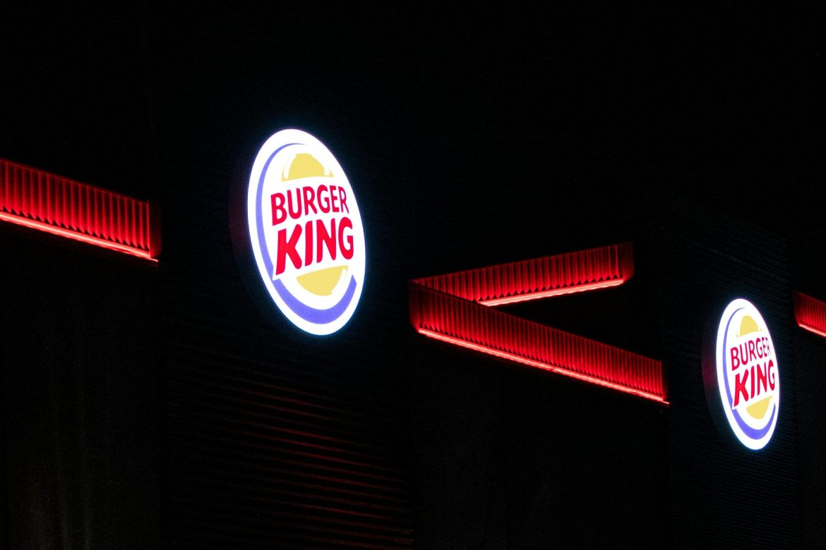Burger King UK, the main operator of the fast-food chain’s British business, is set to begin discussions with lenders for a major refinancing deal nearly eight years after it was acquired by private equity firm Bridgepoint, according to a <a href="https://news.sky.com/story/burger-king-uk-owner-in-talks-about-whopper-of-refinancing-13332106">report by Sky News</a>. The company is looking to secure an additional £40 million in borrowing capacity to fund its long-term business strategy, which includes expanding its store network and upgrading existing locations, the report said. The refinancing effort also involves £110 million of existing debt, with negotiations expected to take place in the coming days. Investment bank DC Advisory is advising Burger King UK and Bridgepoint on the process.Bridgepoint has already committed £35 million in fresh equity to support the company’s growth plans. While the fast-food operator has previously been linked to a potential sale or a stock market listing, sources indicated that Bridgepoint has no immediate plans to exit its investment.Expansion and sales growth fuel funding needsBurger King UK, which directly owns over half of the nearly 600 Burger King outlets in Britain, intends to use the refinancing package to accelerate expansion. The company plans to open more than 30 new restaurants while remodeling 50 existing locations to enhance customer experience and operational efficiency.According to sources close to the business, Burger King UK has been outperforming the broader Quick-Service Restaurant (QSR) sector in like-for-like sales growth. The introduction of its Gourmet Kings range has helped boost sales of higher-margin items, appealing to customers willing to spend more on premium fast food. Meanwhile, its value platform has continued to attract budget-conscious consumers amid ongoing economic pressures.The company has also leveraged promotional campaigns to drive engagement and sales. A recent initiative, Whopper Day, saw the chain offer free burgers to customers who downloaded the Burger King app, further increasing brand interaction and digital engagement.Financial performance remains strongBurger King UK has demonstrated strong financial performance, with its most recent accounts revealing a return to profitability. In August last year, the company reported a 30% surge in total revenues to £381.8 million for 2023, compared to the previous year.CEO Alasdair Murdoch highlighted the company’s continued resilience in a challenging economic environment. “We have seen a resilient trading performance in the first half of 2024, with total sales growth of 5% split equally between the existing estate and contribution from new site openings,” he said.With a workforce of approximately 6,000 employees, the company remains committed to expanding its footprint. Management has indicated that a strong pipeline of new restaurant locations is in place, with further growth expected in the coming years.The post <a href="https://invezz.com/news/2025/03/19/burger-king-uk-seeks-40m-refinancing-to-fund-expansion-report/">Burger King UK seeks £40M refinancing to fund expansion: report</a> appeared first on <a href="https://invezz.com/">Invezz</a> Burger King UK seeks £40M refinancing to fund expansion: report