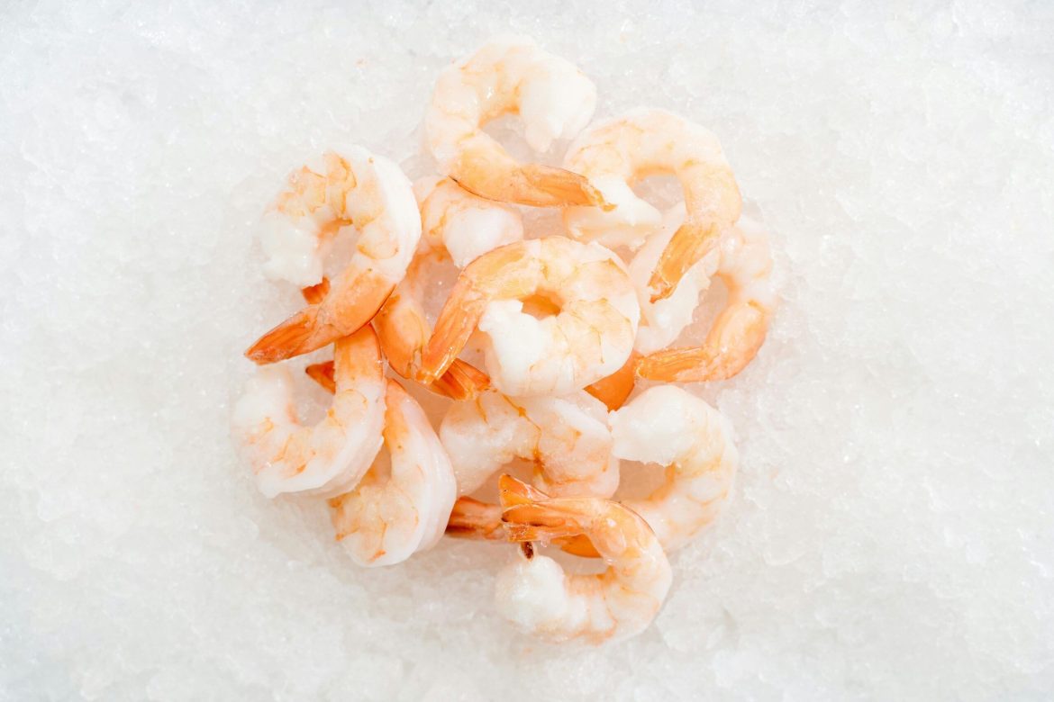 Exporters in India, the biggest supplier of shrimp to the US, say that President Donald Trump’s tariffs could endanger a large number of containers of the frozen delicacy and disrupt global shipments.Ecuadorian exporters state that their country will benefit due to lower tariffs on shrimp, as it is their most important export after oil. This is despite Ecuador being thousands of kilometers closer to the United States than India.Trump’s <a href="https://invezz.com/news/2025/04/07/india-eyes-trade-deal-with-us-holds-off-on-tariff-retaliation/">July plan threatens India’s $7 billion shrimp export market to the US</a>, as it proposes a 26% tariff. This puts pressure on India’s thriving seafood export industry that <a href="https://invezz.com/news/2024/09/30/pursuit-of-profits-by-big-supermarkets-pushing-shrimp-farmers-into-exploitation-research-reveals/">heavily depends on US supermarket chains</a>, including Walmart and Kroger, as buyers seek to renegotiate prices, <a href="https://www.reuters.com/world/india/indian-shrimp-industry-sails-troubled-waters-after-trump-tariffs-2025-04-14/">Reuters reported</a> on Monday. According to the report, tariffs could endanger 2,000 containers of shrimps from Indian ports. Offer prices reducedAs uncertainty causes demand to decrease, Indian exporters have reduced offer prices by 10% and farmers are experiencing a drying up of demand due to the tariffs.S.V.L. Pathi Raju, a 60 year old shrimp farmer from India’s coastal Andhra Pradesh, was quoted in the report:<blockquote>We are suffering huge losses.</blockquote>Raju and other families in the remote village of Ganapavaram are struggling with decreasing sales to exporters. “We are uncertain who can find a solution to our pricing problems,” Raju added.Additionally, the cost of shrimp feed and rental fees for land with saline ponds are significant burdens for many.Uppalapati Nagaraju, another 60-year-old farmer, expressed uncertainty about sustaining prices. He admitted being completely unaware of the concept of tariffs and stated that had he known about them, he would not have started his cultivation.He regrets starting shrimp cultivation only 15 days before the tariff news, due to unpredictable demand from exporters. Exporters remain cautiousThe exporters are nervous because of the current 10% tariff rate, even though Trump has delayed the 26% rate until July.The US and China have emerged as key players in India’s thriving seafood export industry, contributing significantly to the record-breaking figures achieved last year. In 2024, India’s seafood exports reached an all-time high of $7.3 billion, with a total volume of 1.8 million metric tons. This remarkable achievement underscores the growing demand for Indian seafood in major international markets, particularly the US and China. The burgeoning trade relationship between India and these two economic powerhouses had played a pivotal role in propelling the Indian seafood sector to new heights.Andhra Pradesh’s 300,000 shrimp farmers were the primary contributors to the $2.5 billion in seafood exports to the US last year, with shrimp being the main export and the state accounting for 92% of India’s total seafood exports, according to the Reuters report.Other optionsA state government panel, tasked with evaluating the impact of tariffs and exploring ways to increase exports to countries like China, now includes members from the industry.Ecuadorian producers shipped $1.55 billion worth of shrimp in 2024, but they are less optimistic about the future. Indian exporters fear that Ecuador will have a competitive edge due to the planned 10% tariff rate for the South American nation. This is especially concerning since Ecuador is much closer to the US, which is its second-biggest market for shrimp.According to the report, India will be forced to find other markets, like China and the European Union, where Ecuador also sells its products. This will put more pressure on Ecuador’s market share in those regions.The post <a href="https://invezz.com/news/2025/04/14/indian-shrimp-exporters-hit-hard-as-us-alters-tariff-rules/">Indian shrimp exporters hit hard as US alters tariff rules</a> appeared first on <a href="https://invezz.com/">Invezz</a> Indian shrimp exporters hit hard as US alters tariff rules