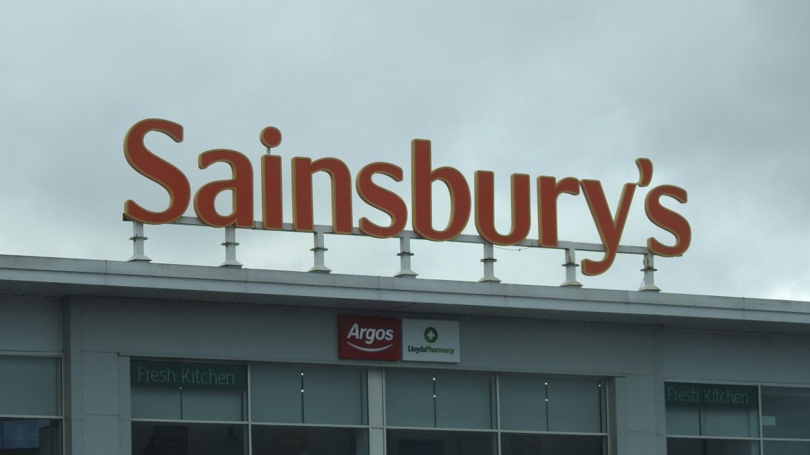 Shares in J Sainsbury PLC surged on Thursday, closing up 4% at 257.8p, making it the top performer on the FTSE 100 index. The rally came after the British supermarket giant reported its full-year financial results, which showed a 7.2% rise in retail underlying operating profit to £1.04 billion for the 2024/25 fiscal year. The result marks the first time Sainsbury’s has posted over £1 billion in annual operating profits, excluding one-off items.The rebound in share price also marks a full recovery from last month’s slump, when Asda’s announcement of price cuts triggered a sell-off across the UK grocery sector. Sainsbury’s stock, which had fallen as low as 223p during the broader market sell-off tied to political uncertainty in the United States, is now trading above the levels seen before Asda’s move.The results appear to validate Sainsbury’s focus on core food retail operations, which performed well amid a difficult trading environment marked by rising costs and heightened price sensitivity among consumers.Profit milestone reached, but outlook remains conservativeWhile Sainsbury’s reported a 38.6% jump in pre-tax profits to £384 million, this figure was supported by a strong performance in its food business and adjusted to exclude one-time restructuring costs, including the closure of in-store cafes and hot food counters.Chief executive Simon Roberts credited the company’s progress to consistent investment in price, product quality, and customer service. “We’ve delivered a strong set of results by staying true to our strategy of giving customers what they want: great value, quality and service,” he said.Despite the record-breaking performance, the company struck a cautious note for the year ahead. It forecast retail underlying operating profit of around £1 billion for the 2025/26 financial year, below analysts’ expectations of £1.08 billion. The guidance reflects concerns about persistent inflation, higher labour and supply chain costs, and the intensifying competition in the UK supermarket sector.Analysts find guidance “subdued” but foresee room for upside if market stabilises While the market welcomed the past year’s strong performance, analysts offered mixed views on the outlook. Shore Capital analysts Clive Black and Darren Shirley noted that Sainsbury’s is in a solid operational position and plans to increase market share in food retailing. However, they acknowledged that the subdued guidance reflects a prudent approach amid a shifting competitive landscape.“The guidance shows determination to defend value credentials following Asda’s aggressive strategy,” they wrote in a note to clients. “It may be conservative, but leaves room for upside if market dynamics stabilise.”RBC Capital Markets analysts Manjari Dhar and Richard Chamberlain said the lower-than-expected guidance was disappointing given Sainsbury’s strong prior performance and <a href="https://invezz.com/news/2025/04/10/tesco-sainsburys-miss-out-on-ftse-rally-amid-pricing-pressure/">recent commentary from Tesco</a> that signalled higher competitiveness across the board.“With the sector about to be embroiled in a trade war of its own, Sainsbury is preparing for the fight with some added momentum which should provide some protection,” said Richard Hunter, head of markets at Interactive Investor.Outlook to help Sainsbury’s manoeuvre stiff competition The UK’s supermarket sector has entered a <a href="https://invezz.com/news/2025/04/10/tesco-sainsburys-miss-out-on-ftse-rally-amid-pricing-pressure/">phase of heightened competition</a>, with price cuts emerging as a key weapon in the battle for market share. Asda’s decision to slash prices sent a ripple effect across the industry, forcing peers like Sainsbury’s, Tesco, and Marks & Spencer to react. Analysts believe the outlook from Sainsbury’s is deliberately cautious, allowing room to manoeuvre should conditions worsen.Hargreaves Lansdown’s Aarin Chiekrie described the guidance as “conservative,” roughly 8% below consensus, and said it mirrors Tesco’s approach in offering flexibility during a volatile period.“But shy of an all-out price war, there could be room for positive surprises as the year progresses,” he added.Despite near-term uncertainty, investor sentiment towards Sainsbury’s remains relatively positive. According to LSEG data, eight out of thirteen analysts rate the stock a “buy” or “higher,” while the median price target stands at 300p—implying further upside potential.As Sainsbury’s prepares for a potentially difficult year ahead, it appears to be entering the fray with both momentum and caution.The post <a href="https://invezz.com/news/2025/04/17/sainsburys-shares-rise-as-profit-tops-1bn-analysts-flag-cautious-guidance-amid-price-war-risks/">Sainsbury’s shares rise as profit tops £1bn; analysts flag cautious guidance amid price war risks</a> appeared first on <a href="https://invezz.com/">Invezz</a> Sainsbury’s shares rise as profit tops £1bn; analysts flag cautious guidance amid price war risks