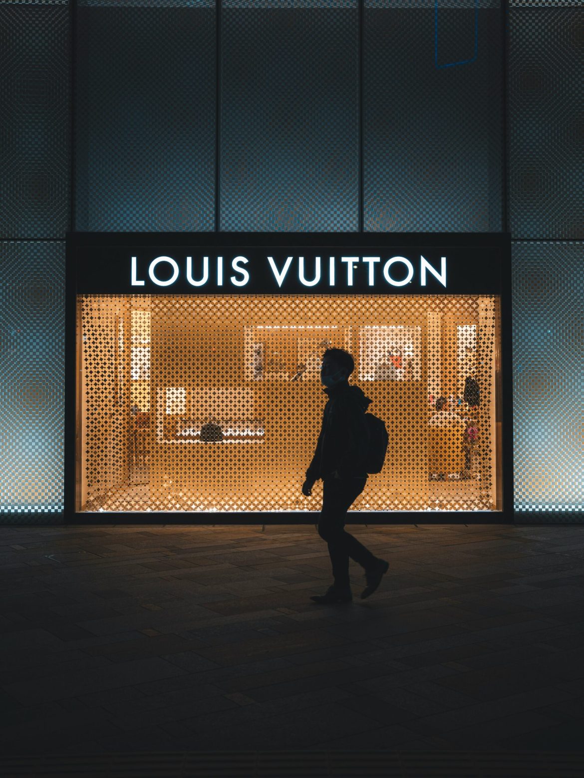 Shareholders of LVMH Moët Hennessy Louis Vuitton voted on Thursday to allow Bernard Arnault to remain at the helm of the company until the age of 85, extending the reign of the man who built the world’s most valuable luxury goods empire. The move, approved with more than 99% support, raises the maximum age limit for the group’s chairman and chief executive from 80 to 85.This marks the second such amendment in recent years. In 2022, LVMH lifted the retirement threshold from 75 to 80. With Thursday’s vote, the board has further solidified Arnault’s position at the top, even as investors grow increasingly uneasy over the absence of a clearly communicated succession plan.A meticulously constructed empireBernard Arnault, 76, has led LVMH since 1989, steering it through decades of aggressive expansion, blockbuster acquisitions, and surging demand for luxury goods. From the takeover of Christian Dior and Louis Vuitton to the $16 billion acquisition of Tiffany & Co in 2021, Arnault has crafted a 75-brand empire that spans fashion, jewellery, wine, spirits, hospitality, and more.His hands-on leadership style—inspecting store layouts, micromanaging deals, and ensuring consistent brand storytelling—has helped deliver exceptional shareholder returns. According to LSEG data, LVMH has generated an average total return of 13% per year under its leadership, far outpacing the 3% return of the STOXX 600 over the same period.Yet the very qualities that have made LVMH a success are now sources of concern. Investors worry that Arnault’s immense influence means that his sudden departure could trigger a sharp decline in LVMH’s share price. At the same time, the company’s heavy reliance on a single individual introduces significant long-term risk.The family behind the façadeAll five of Arnault’s children are now deeply embedded in the group’s leadership structure. Delphine Arnault, 50, serves as CEO of Christian Dior and is widely seen as a leading candidate. Antoine Arnault, 47, oversees communications, image, and sustainability, and chairs Loro Piana.The younger siblings—Alexandre, 33, Frédéric, 30, and Jean, 26—hold key roles at Tiffany & Co, TAG Heuer, and the watches division, respectively.Each child holds a senior position, and four of them sit on LVMH’s board. But despite their prominence, Arnault has offered no public indication of who will eventually take over.The family’s involvement gives the appearance of a tightly managed succession-in-training, yet no formal plan has been communicated.“The market has long priced in the ‘Arnault premium,’” said a Paris-based luxury analyst. “But that also means there’s enormous key-man risk. Investors want to know what LVMH looks like in a post-Arnault world.”Opaque planning fuels uncertaintySome shareholders have begun to question the group’s lack of transparency. Two investors told Reuters Breakingviews that they are unaware of any formal emergency or long-term succession plan. LVMH’s most recent governance report only briefly references a “review of succession planning,” offering no further detail.In 2022, changes were made to LVMH’s controlling structure to ensure long-term family control. Arnault restructured the family holding company, Agache SCA, stipulating that the five children would share equal ownership through Agache Commandité. The shares cannot be sold or transferred for 30 years, nor can they pass outside the family or their direct descendants.This arrangement effectively guarantees that LVMH will remain under family control for the foreseeable future, but it does not answer the central question of who will lead. Key decisions in Agache now require unanimous agreement from all five siblings—a setup that could prove cumbersome or fractious in time.Lessons from luxury rivalsLVMH’s opaque approach to succession contrasts with other family-led luxury firms. François Pinault, founder of rival group Kering, passed his holding company to his three children in 2001. In 2005, his son François-Henri Pinault formally took charge as CEO at age 42, providing clear continuity for investors and the business alike.By comparison, LVMH has opted for incremental changes that extend Bernard Arnault’s grip on the company without offering the market a clear view of what comes next.“Succession isn’t just about naming a CEO,” said Irina Curbelo, co-founder of Percheron Advisory. “It’s about preserving the essence of the brand empire, and ensuring that family governance doesn’t turn into a bottleneck.”No imminent change, but longer-term risks remainDespite growing concerns, few doubt Arnault’s ability to continue leading LVMH in the short term. He remains mentally sharp, fully engaged, and evidently trusted by the board and shareholders. But with the latest age-limit amendment pushing any handover potentially another decade away, governance questions are unlikely to fade.As the luxury industry becomes more competitive and globally complex, the stakes of an unclear succession only grow. The question facing LVMH now is not just who will succeed Bernard Arnault, but when, how, and whether the group will be prepared when the moment inevitably arrives.The post <a href="https://invezz.com/news/2025/04/18/as-lvmh-extends-arnaults-reign-succession-concerns-still-linger-heres-why-investors-worry/">As LVMH extends Arnault’s reign, succession concerns still linger: here’s why investors worry</a> appeared first on <a href="https://invezz.com/">Invezz</a> As LVMH extends Arnault’s reign, succession concerns still linger: here’s why investors worry
